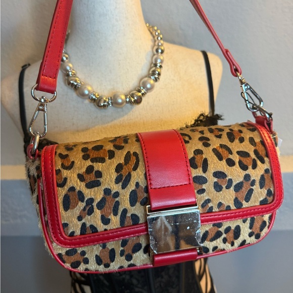 AKIRA Handbags - AKIRA Leopard Print Shoulder Bag with Red Accents